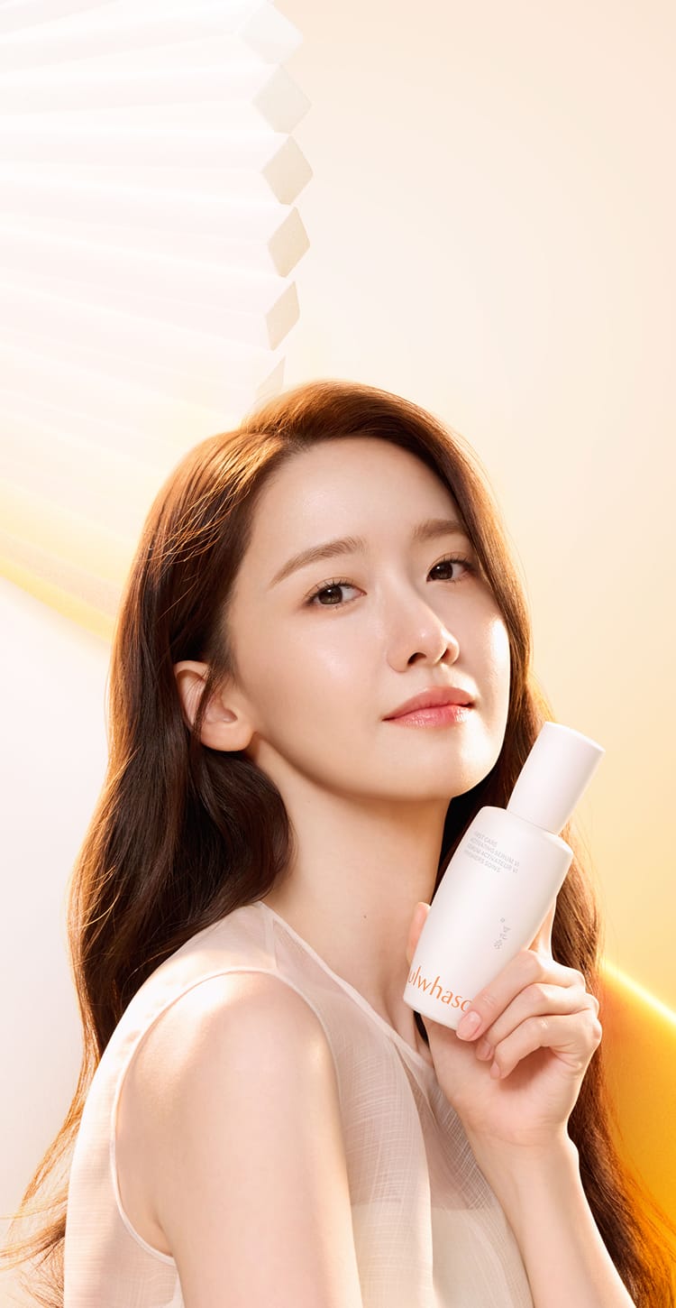 Sulwhasoo model Yoona holding first care activating in her hand